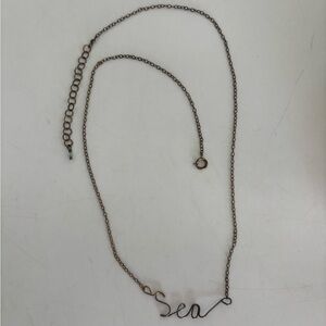 Danty “Sea” gold necklace a little tarnished